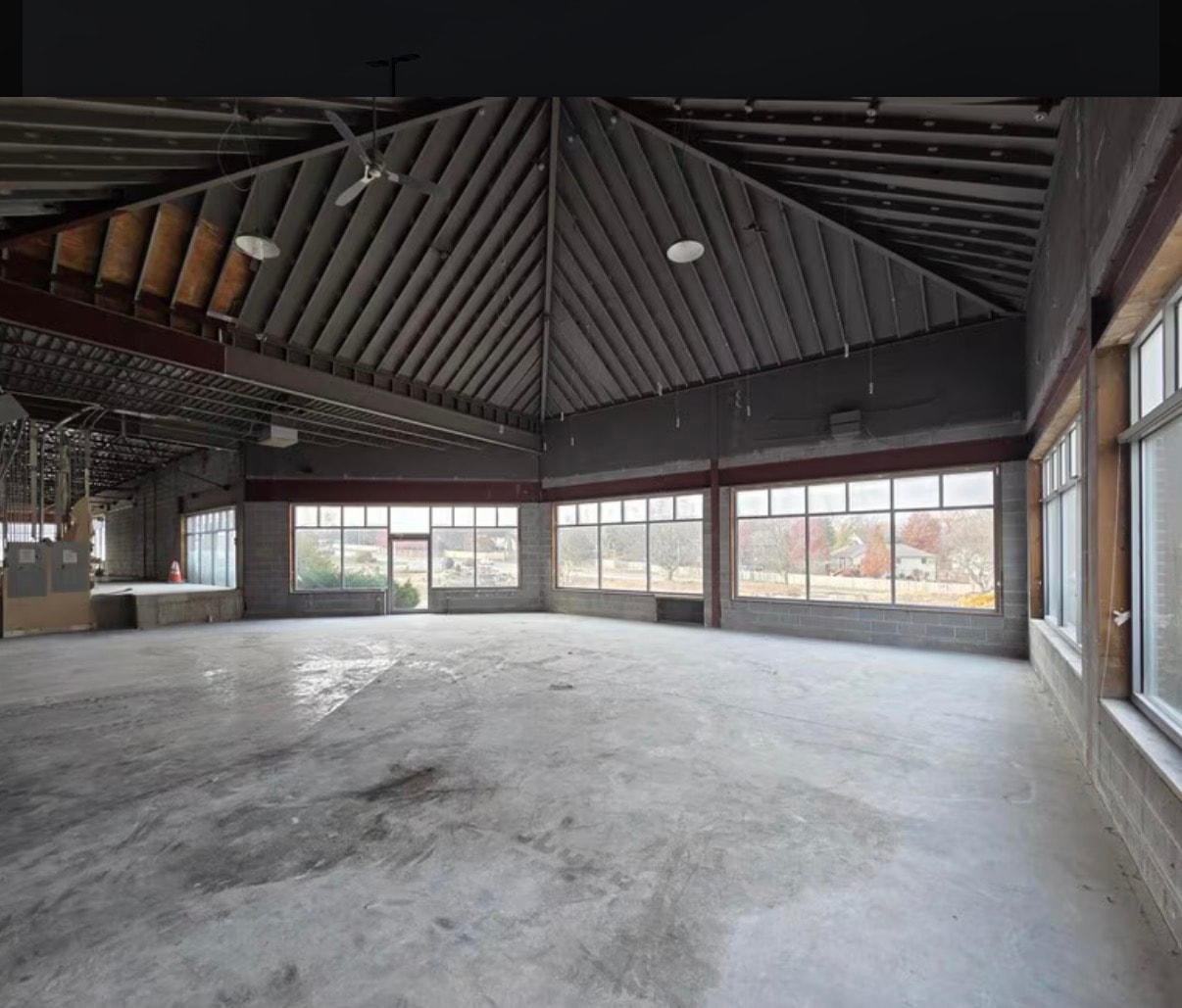 Westbrooke Shopping Center — interior vaulted ceiling and storefront windows